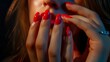 Close up woman showing her red nails