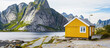 © Olya Fedorova - Cute yellow house on the lake in the mountains