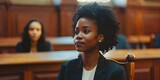 Fototapeta Panele - A Black female lawyer zealously advocates for defendants' rights in court before a judge and jury. Concept Lawyer, Advocacy, Defender, Justice, Courtroom