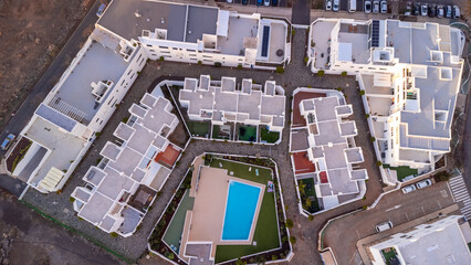 Wall Mural - Aerial view of an urbanization in Agaete at summer sunset in Gran Canaria. Spain