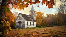 A Rustic Country Church Surrounded By Autumn Foliage.