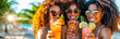 Smiling women in sunglasses holding summer cocktails, cheers to camera.