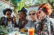 A diverse group of stylish women sitting at a table filled with food, socializing and enjoying brunch together