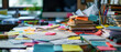Messy desk with papers and sticky notes, selective focus, busy and chaotic work environment