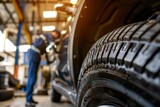 Fototapeta  - Tires in the auto repair service center