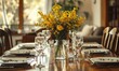 A chic dining table set for a dinner party, bouquet of yellow flower