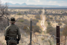State Of Texas, Sheriff Inspects The State Border, Policeman Checks The Integrity Of The Barbed Wire On The State Border, Protection From Illegal Migrants.