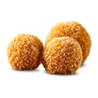 Sesame balls crispy and seed coated in a transparent glass container low