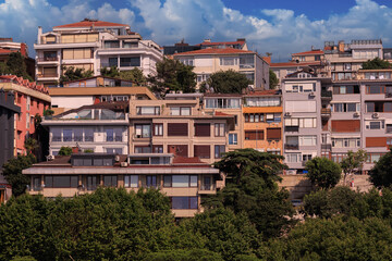 Sticker - Beautiful houses and city streets of the southern city with green plants, public place in Turkey, on a summer sunny day