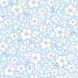 Vector illustration. Seamless pattern of white small flowers on a blue background. Ditsy floral blue pattern, field of flowers, print for fabric, textile, wallpaper, baby clothes, packaging