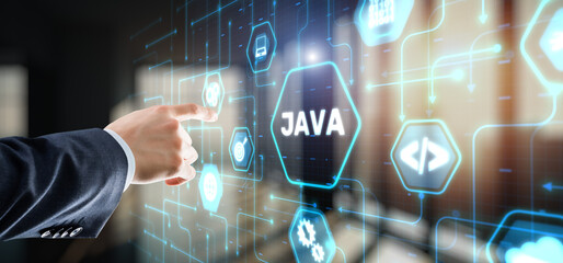 Businessman clicks Java programming language application concept on virtual screen