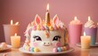 Birthday unicorn pastel cake with candles