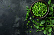 Green fresh peas on a dark background