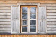 Wooden Rustic Window In Cottage House. Wooden Home. Rusty Architecture. Podlasie Region In Poland Vintage Wall. Peeling Paint Decorative Exterior Shutter. Wood Home Wall Facade. Living In Woods.