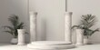 A set of three white pillars with a plant in the middle. Ideal for architectural and interior design projects