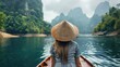 © Fotograf - A woman in a hat sitting on a boat. Perfect for travel brochures