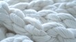 A close up of a pile of white yarn, perfect for craft projects