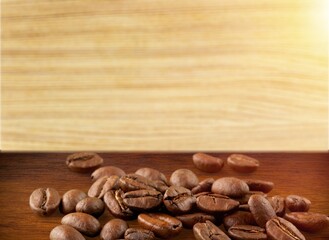 Canvas Print - Many roasted aroma coffee beans on color background