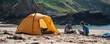 families camping using tents on the coast