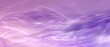 Abstract background with a hazy violet gradient.