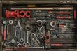 Focused view inside an engineer’s toolbox, revealing an assortment of tools used in field inspections.