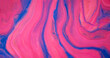 Glitter fluid flow. Paint mix layers. Marble texture. Defocused pink blue color shiny sparkling particles ink liquid emulsion spill abstract art background.