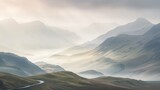 Fototapeta  - A serpentine road winding through misty, rolling hills under a soft, pastel sunrise. A tranquil, ethereal landscape inspiring travel and solitude.