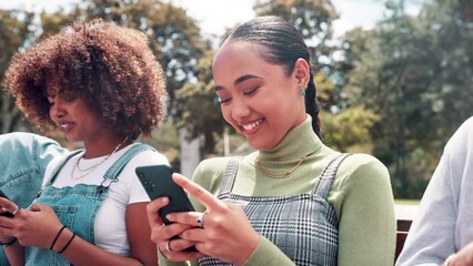 Wall Mural - Phone, friends and people in park at university for social media, networking and online chat on bench. College, campus and men and women laugh on smartphone for funny website, internet meme and text