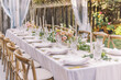 Chic garden wedding table with floral centerpiece