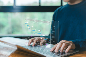 Fototapete - updating and managing milestones on a timeline Gantt chart in technology online. project planner in software. schedule plan management work update and workflow. concept appointment staff of business