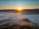 Fototapeta Dziecięca - Beautiful morning Sunrise and Fog flow over mountain in Ai yerweng, Yala, Thailand