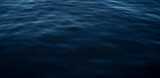 Fototapeta  - Blue water ocean surface, calm dark sea background