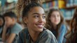 © Sippung - Smiling adolescent girl in school participating in a group learning activity