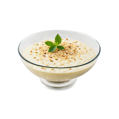 Phirni ground rice pudding in a clear glass dish three quarter view