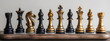 A row of chess pieces with gold and balck color.