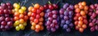 Ripe grapes of various colors in the garden tile 
