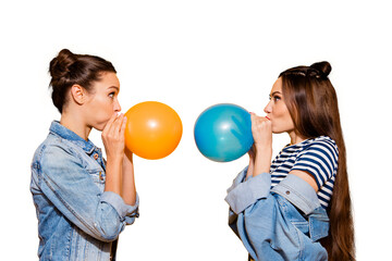 Sticker - Photo portrait of two brunette hair lady look to each other blow fly ball stand isolated on yellow shine background make staring eyes big cheeks