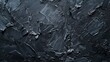 A dark gray background or texture for a painting