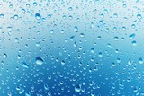 Fototapeta Natura - water droplets on a glass surface