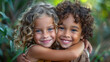 Two beautiful curly young multiracial girls girlfriends or sisters hugging and laughing. Meeting of friends. Friendship Day. International Women's Day. National Siblings Day. Twins days. Copy space