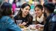 © lelechka - Asian friends enjoy eating food on street food restaurant with crowd of people