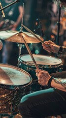 Wall Mural - Drummer in action, close-up on hands and sticks, the heartbeat of a rock band performance