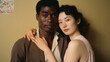 © chand - Portrait of an African American husband and Asian wife, diverse couple.