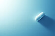 Pill on blue background, medicine concept