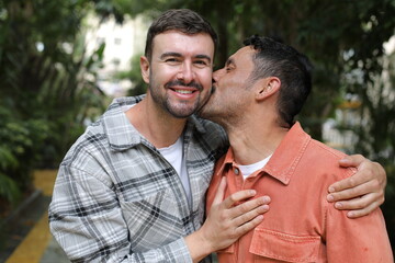 Wall Mural - Man kissing his handsome boyfriend 