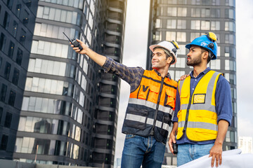 Wall Mural - Contractor, Two civil engineers checking information from blueprint with teamwork, project manager planning and collaboration, outdoor construction worker and floor plan for urban development in city