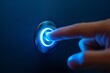 Close-up of a finger pressing a glowing blue power button on a dark background.
