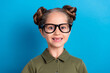 Portrait of positive funky schoolkid lady impressed incredible kindergarten news isolated blue color background