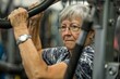 An older woman is actively working on a machine in a gym, focusing on strength training exercises
