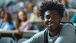 © Keitma - Portrait of an black afro american happy university student sitting in a college lecture hall